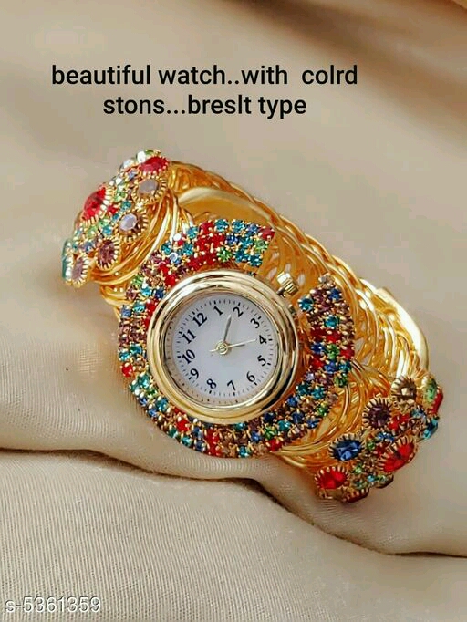 Beautyful Watch...With Colrd Stons....Breaslt type.